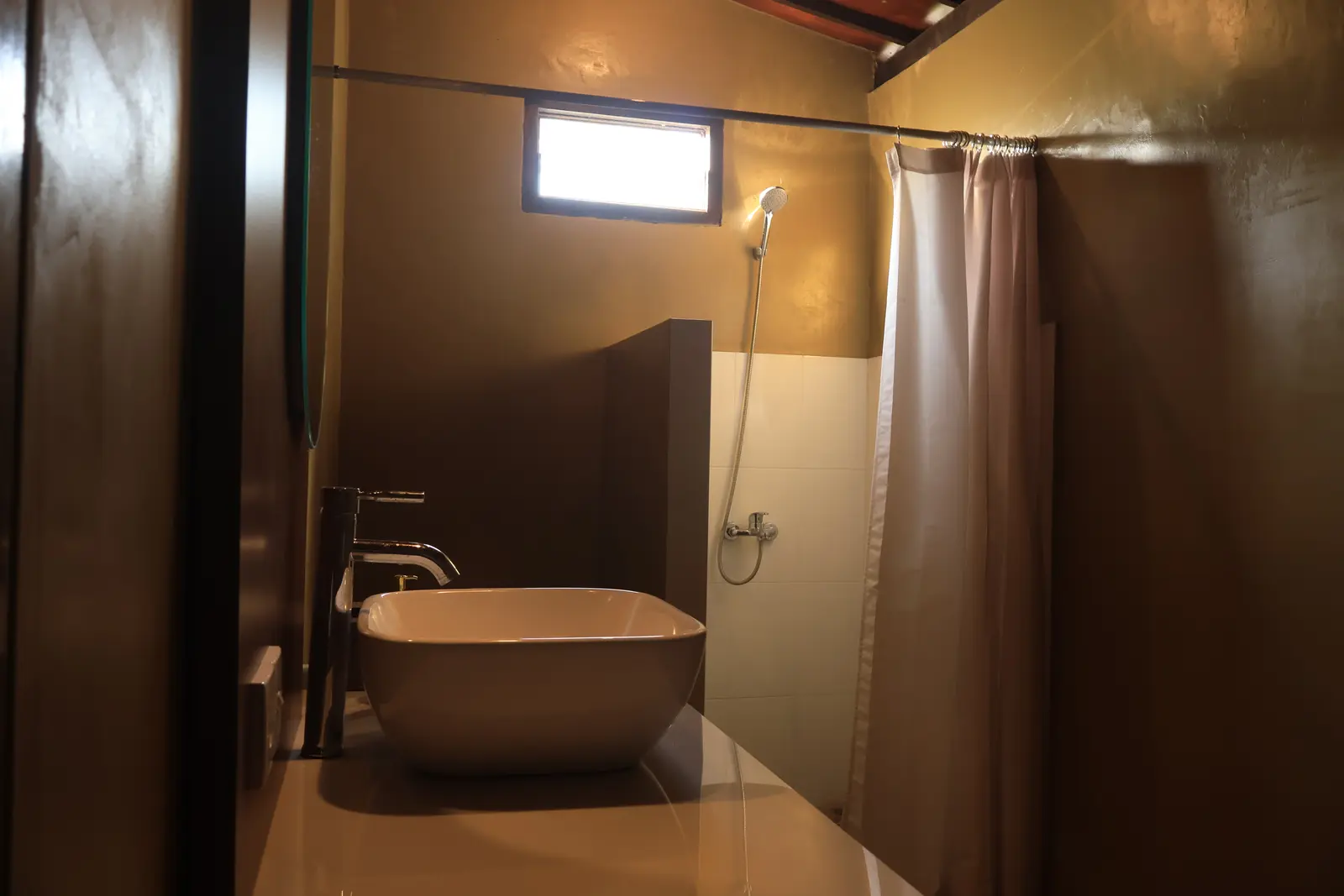 Private bathroom with freestanding bath and shower