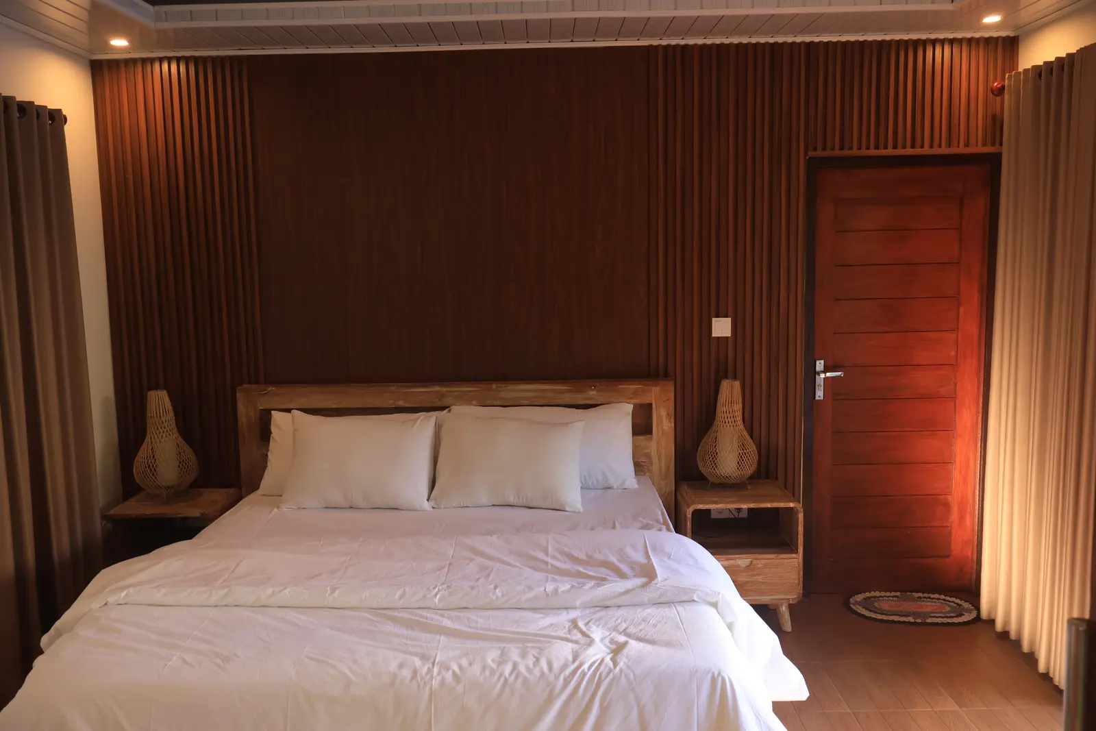 First bedroom with warm wood interior