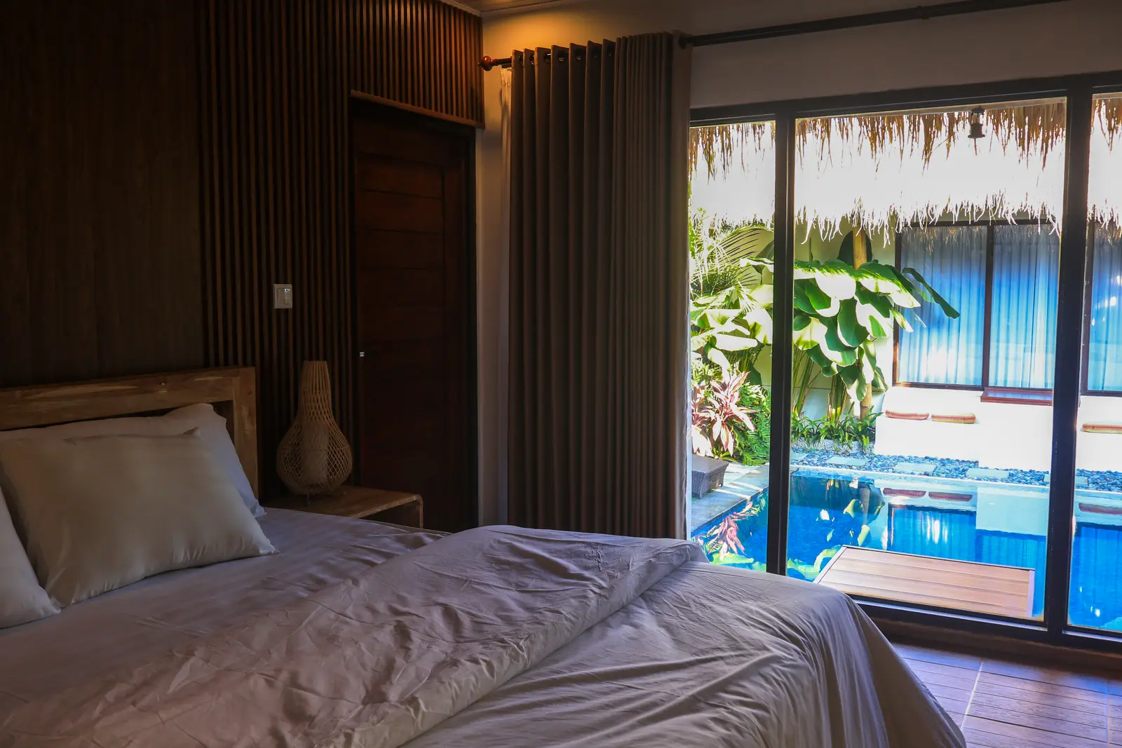 Bedroom opening toward the private pool