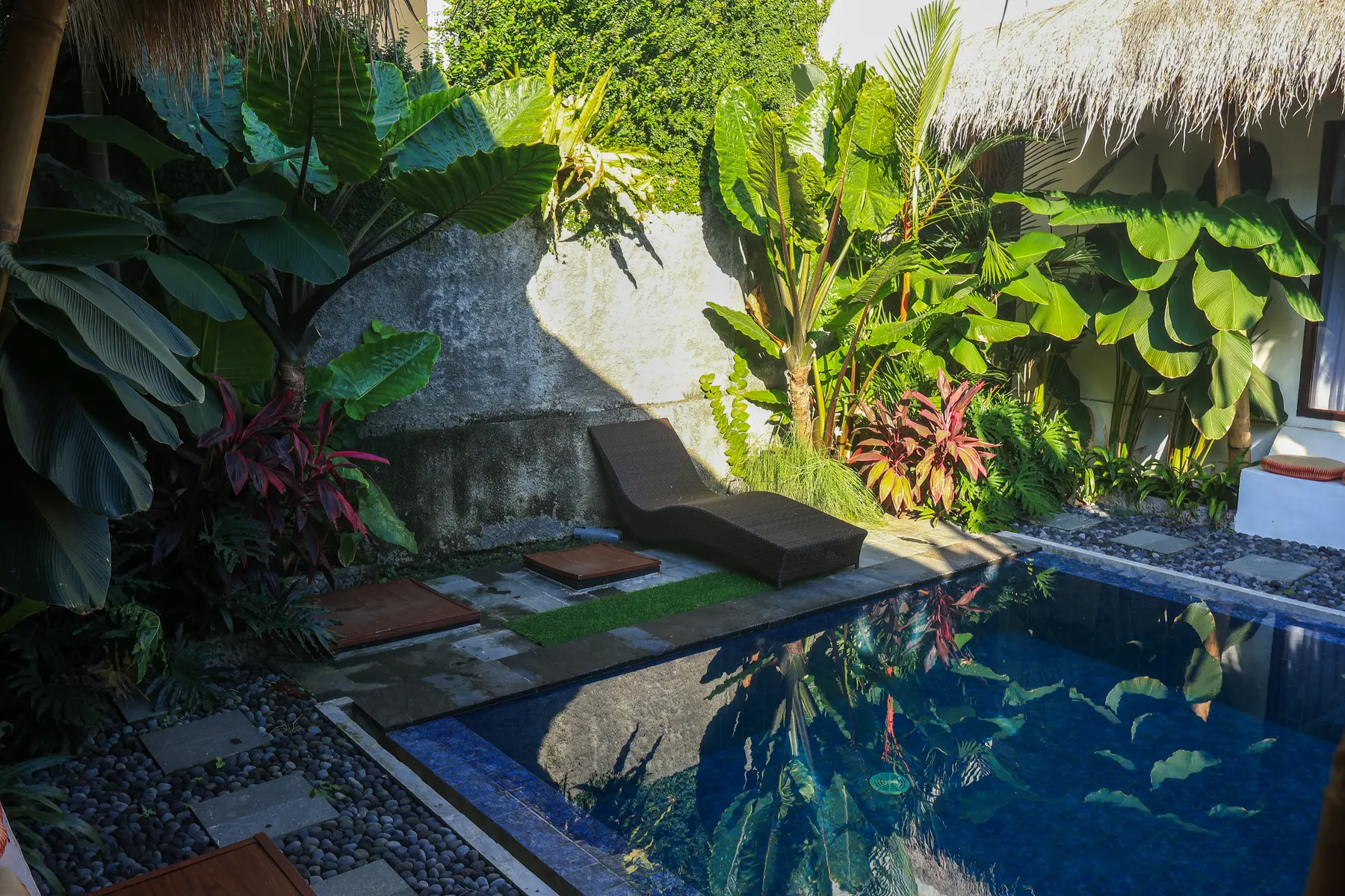 Private pool and tropical garden at J Ming Villa